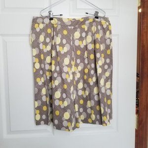 i.e. yellow polka dot work skirt.
